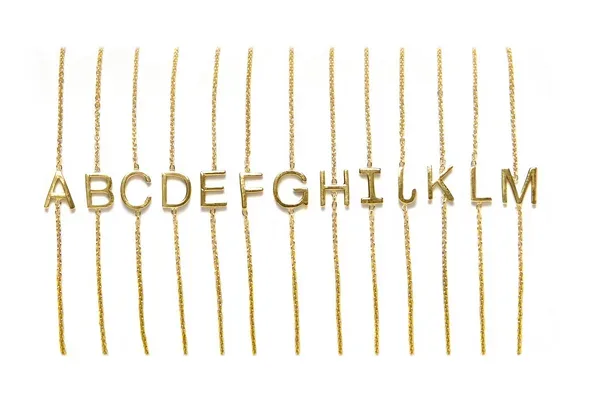 Custom jewelry for mom: Letter necklaces by Maya Brenner