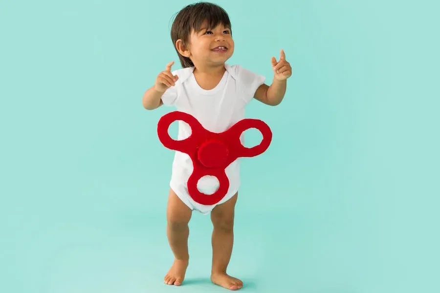 Baby Halloween costumes with onesies: DIY Fidget Spinner Costume by Brit + Co.