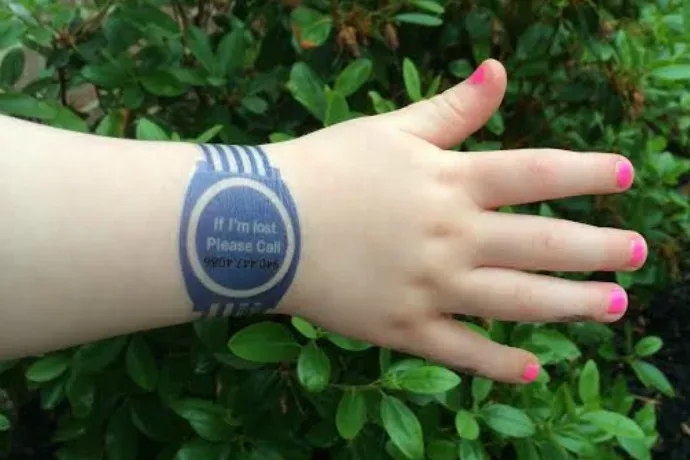 Temporary tattoo emergency contact number bracelets. So great for travel!