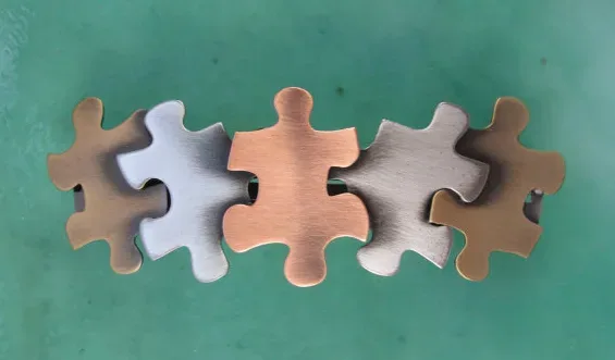 A puzzle piece barrette that just fits for World Autism Awareness Day