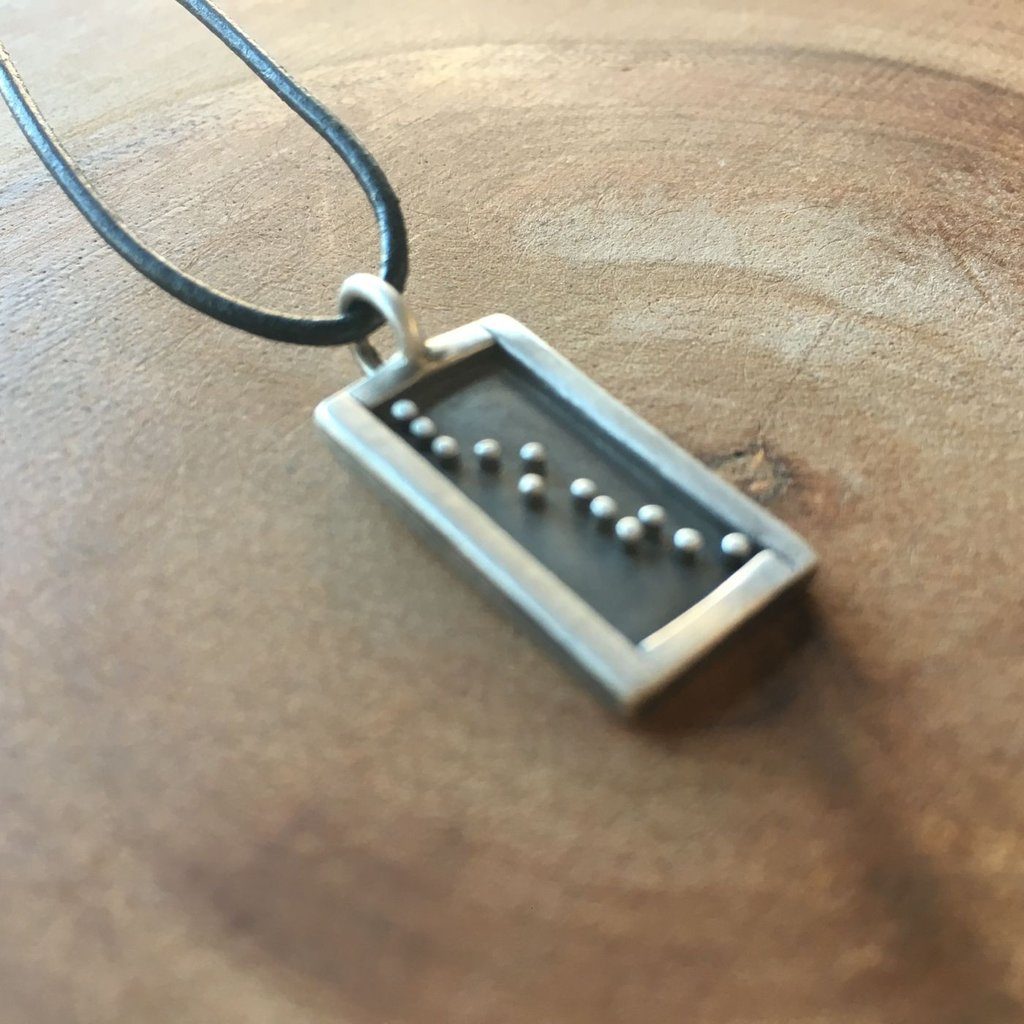Feelthe Love Necklace from Heart & stone supporting the International Rescue Committee