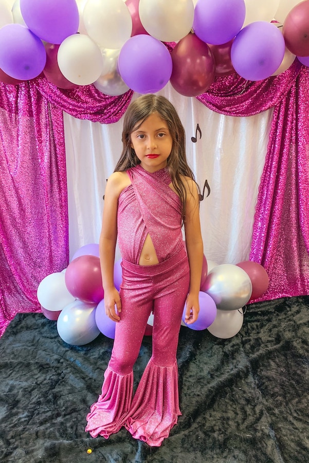 90s Halloween costume ideas for kids: Selena costume via Belle Threads Boutique