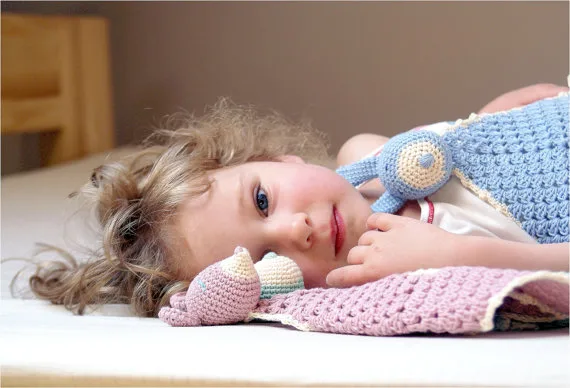 Handmade crocheted baby toys that could make you want another baby. (Or at least one to give them to.)