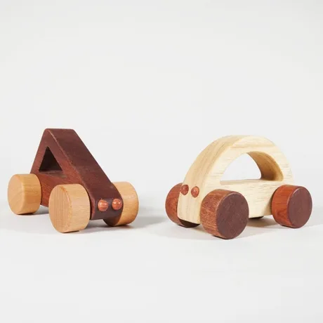 Gorgeous wooden cars babies can drive. And chew.
