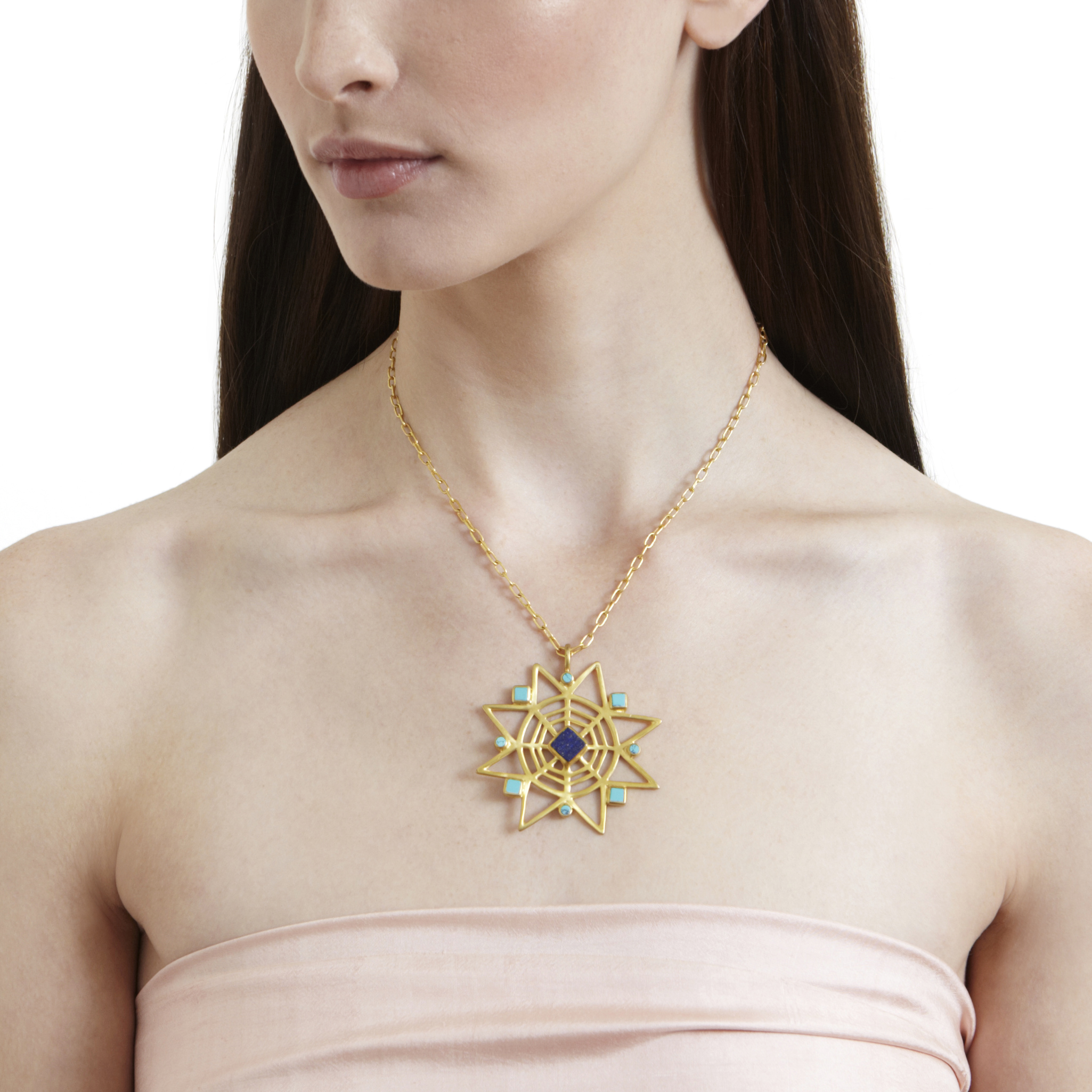Gifts that give back: star necklace with lapis and turquoise to support training of afghan artists