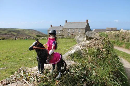 Lottie rides her pony