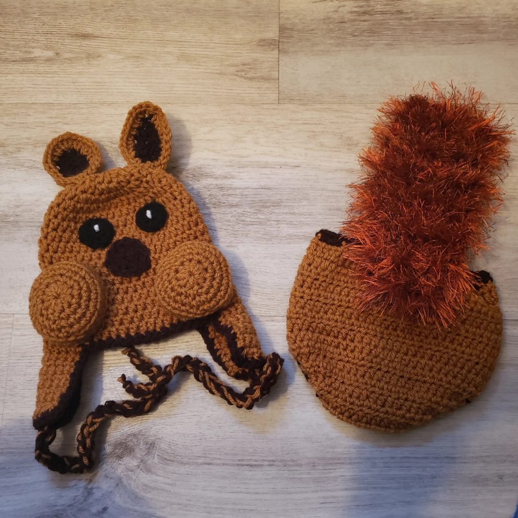 Babywearing halloween costume ideas: You be a tree, let the baby be a squirrel in this hat from Yarnabing Yarnaboom