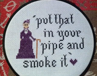 Downton Abbey’s Dowager Countess puts the cross in cross-stitch