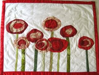 A poppy quilt that makes my uterus jump