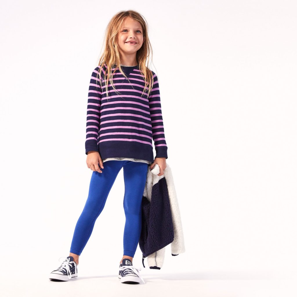 A 9 year old girl picks her favorite clothes for a 9 year old girl - durable leggings in every color from Primary