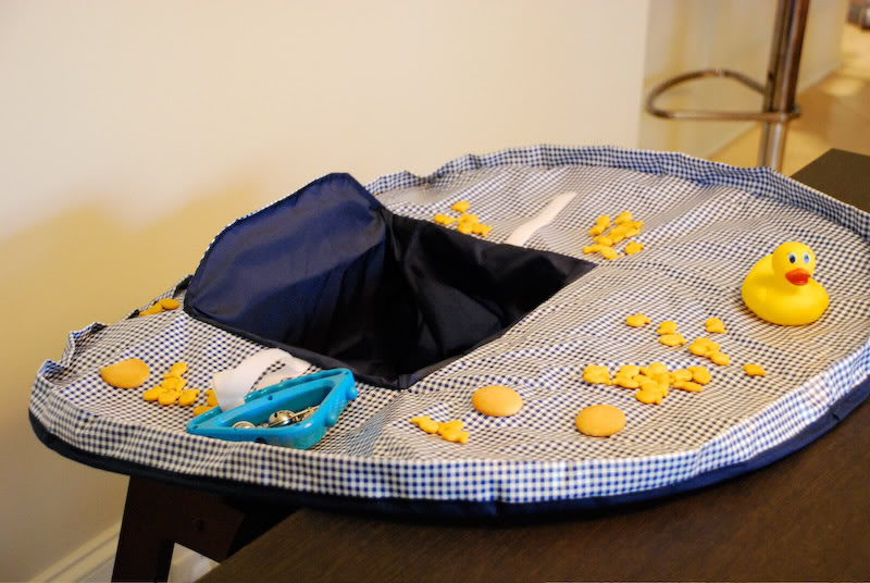 The Neatnik Saucer – A better option than high chair covers the size of a schoolbus