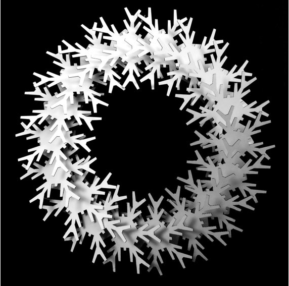 A cool modern take on the holiday wreath that’ll never wilt or shed