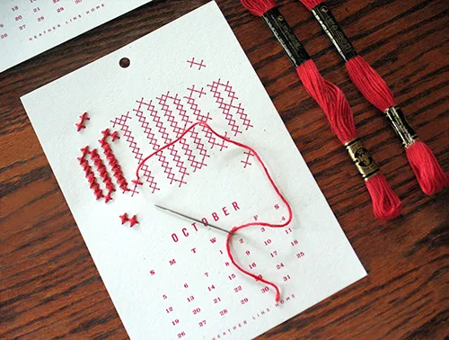 This cute and crafty DIY calendar kit has us in stitches. Literally.