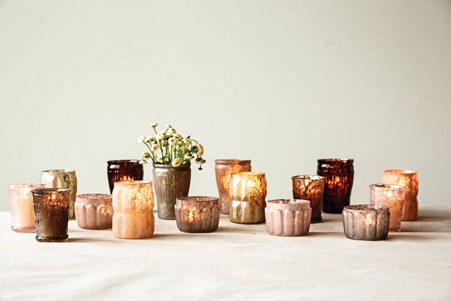How to decorate with tea lights: Mix together votives and bud vases for an eclectic look | via Target