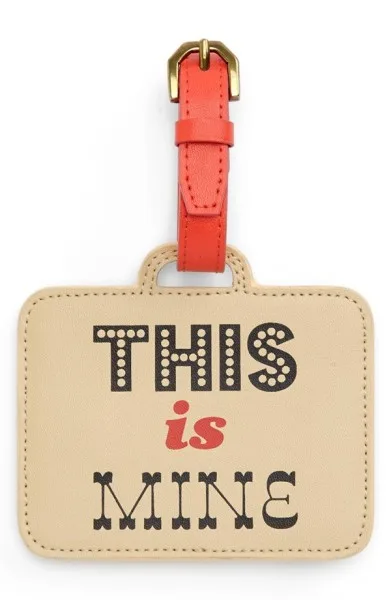 The luggage tag that says hands off. Pretty clearly.