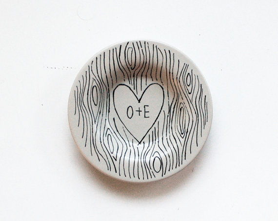 Lay off those tree trunks, lovers. This personalized ring holder will do just fine.