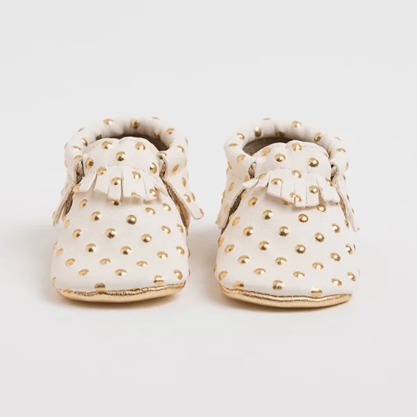 Handmade leather baby moccasins at Freshly Picked | Cool Mom Picks