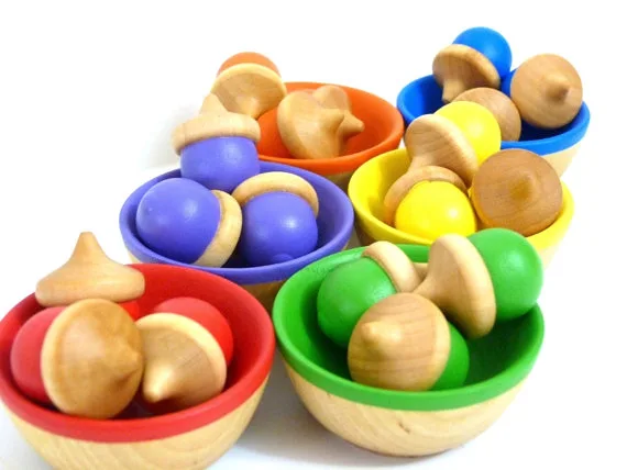 Handmade wooden learning toys: Almost Crunchy rainbow sorting bowls on Etsy | Cool Mom Picks