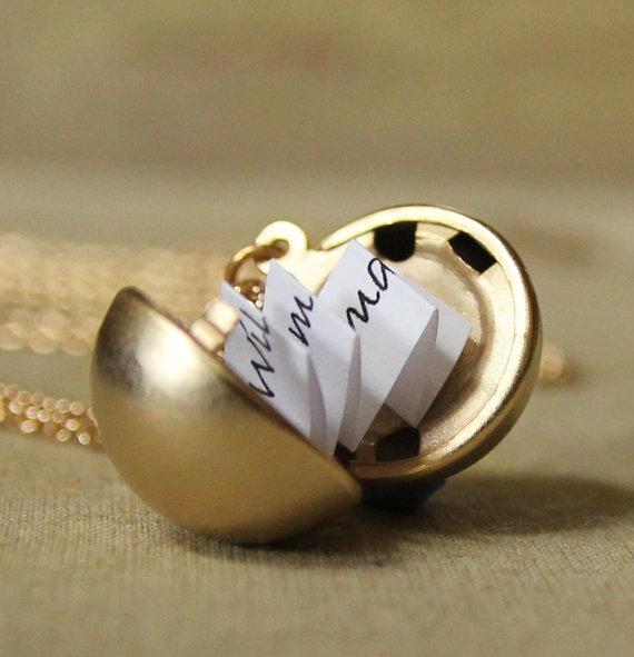 Vintage lockets on Etsy that hold more than secret photos, they hold a secret message.