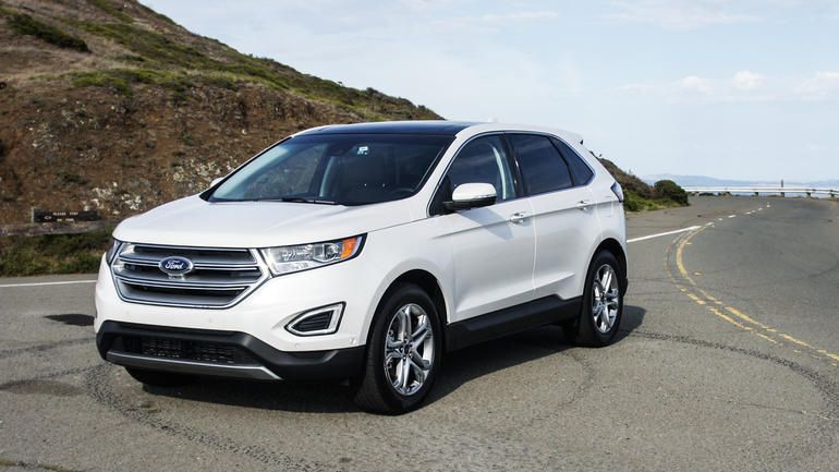 Cars for big families: The Ford Edge can fit 3 child car seats in the second row