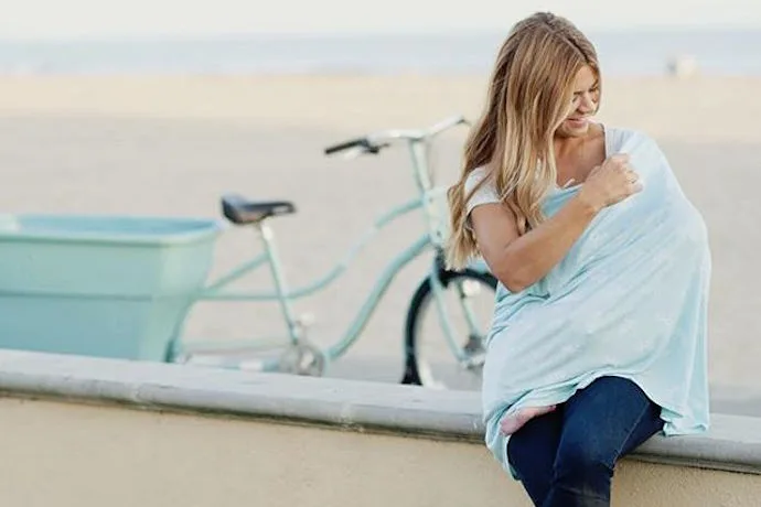The smart 4-in-1 nursing cover that covers way more than your feeding baby.