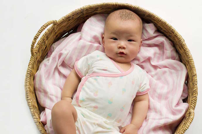 Cute organic baby bedding — and experts who will help you find a favorite — from Monica and Andy