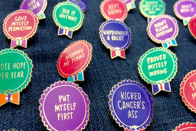 The new Everyday Bravery Pins from artist Emily McDowell: Because sometimes just getting out of bed deserves a medal