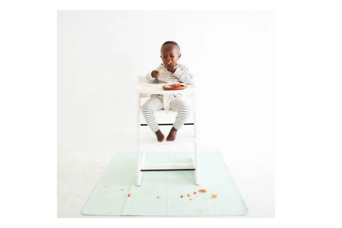 Gathre’s bonded leather playmats are wipeable, waterproof, and so chic.