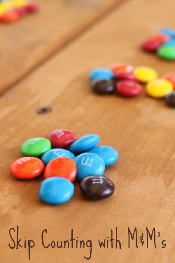 Math Games with leftover Halloween candy: M&M Skip Counting math project from Learn Play Imagine