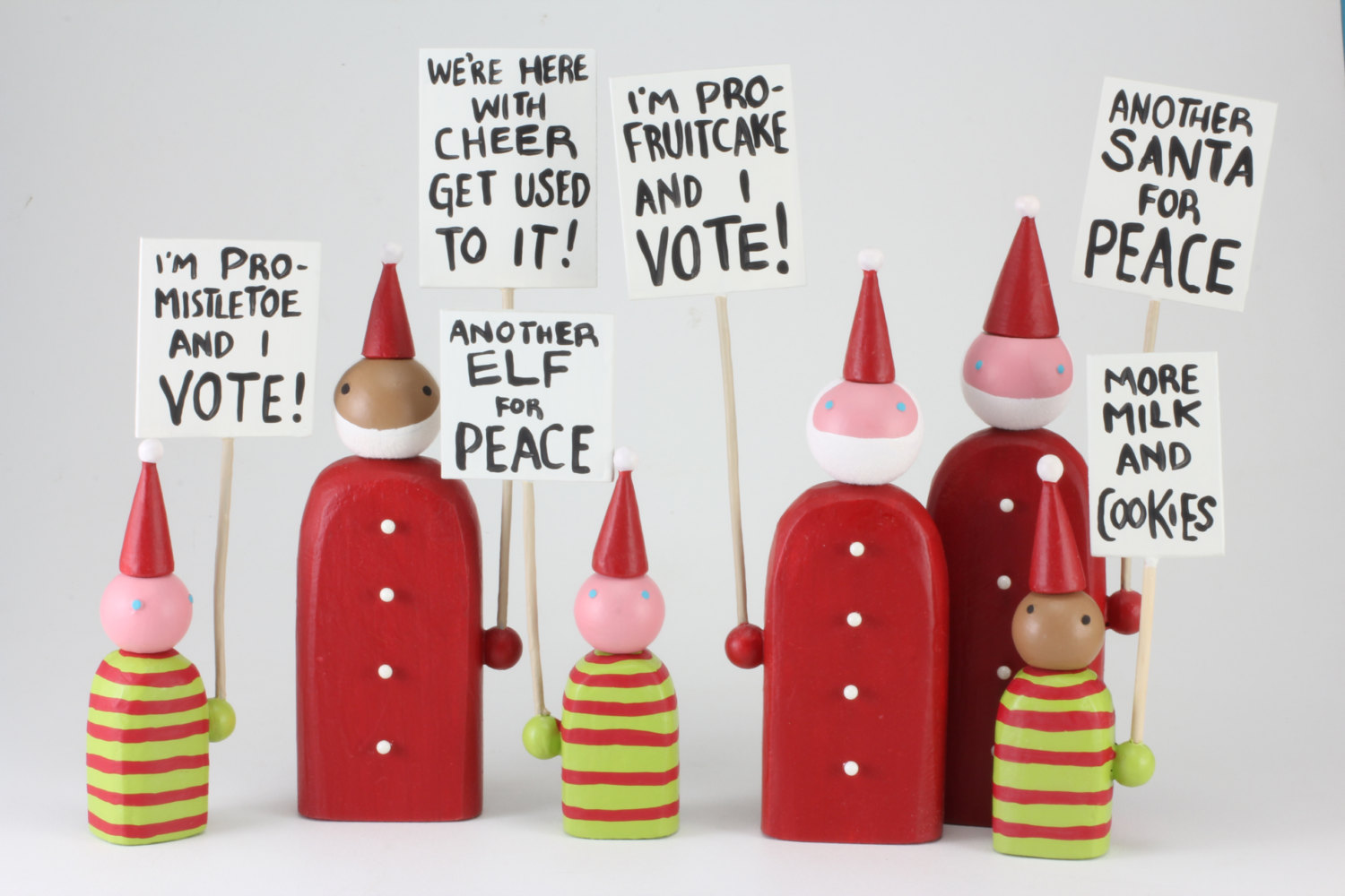 Protesting elf and Santa figurines on Etsy: Hilarious gift for socially active friends with a sense of humor