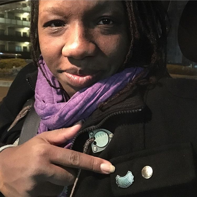 RGB Dissent Collar Pin worn by Ameenah - accessorizing meets activism!
