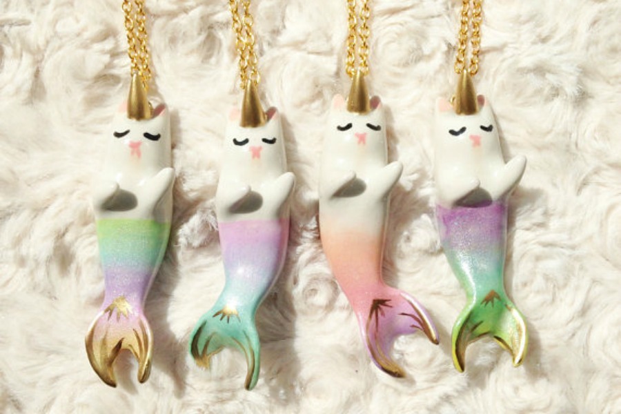 If coveting these crazy popular cat-mermaid necklaces is wrong, we don’t want to be right.