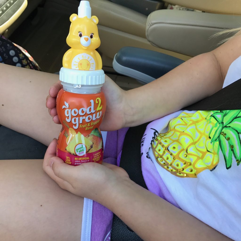 Road trip tips for families: Good2Grow juice bottles have spill-proof caps and can be reused for the rest of the trip as water bottles (sponsor) | © Kristen Chase for mompicksprod.wpengine.com