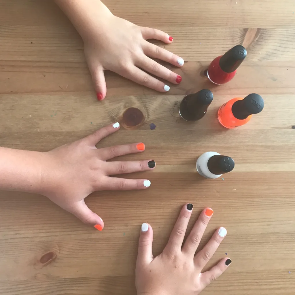 8 subtle ways your kids can show their team spirit: Color coordinated nail polish