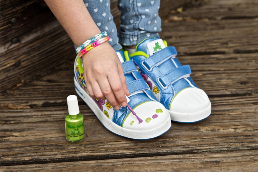 Painting leather shoes store with nail polish