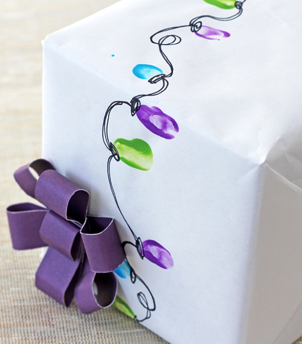Creative holiday gift wrapping ideas: Fingerprint Christmas Light Paper by Splash of Something