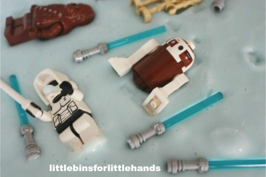 DIY Star Wars slime recipes: Glow-in-the-Dark Light Saber LEGO Star Wars Slime by Little Bins for Little Hands