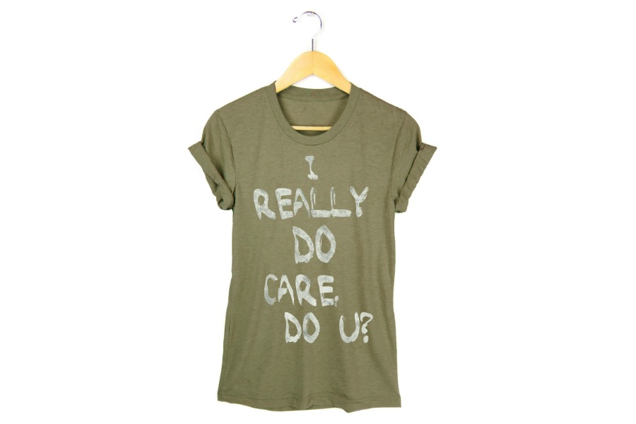 I Really Do Care Do U olive t-shirt, with 100% of the proceeds supporting RAICES #keepfamiliestogether