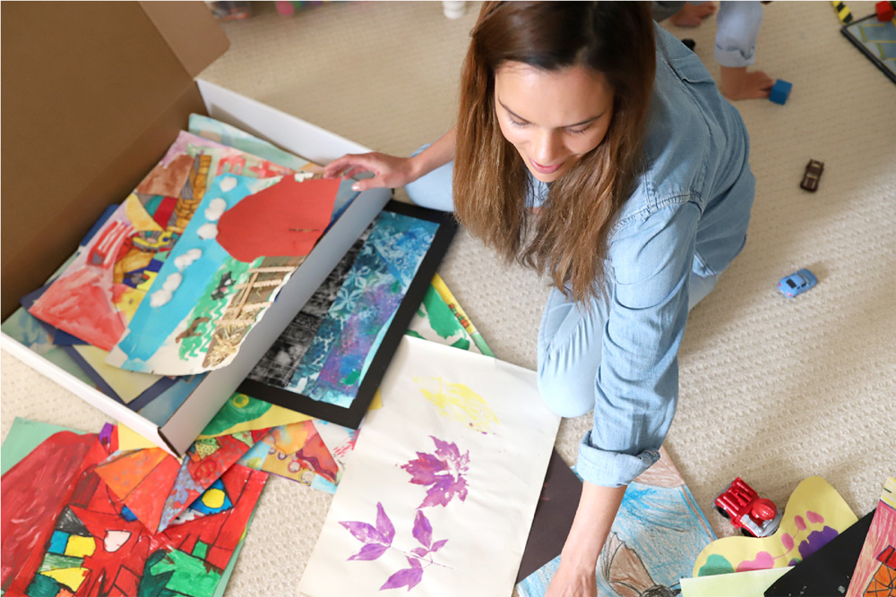Creative ways to display kids' artwork: Use the Artkive concierge service to catalog and digitize all your kids' artwork, then turn it into a custom album!