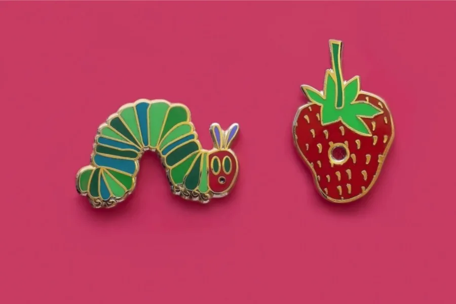 Out of Print's new Eric Carle Caterpillar backpack bling for young readers