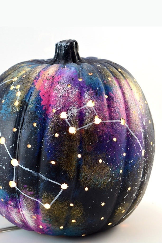 Cool Halloween crafts for teens: Galaxy painted pumpkin tutorial via Dream a Little Bigger