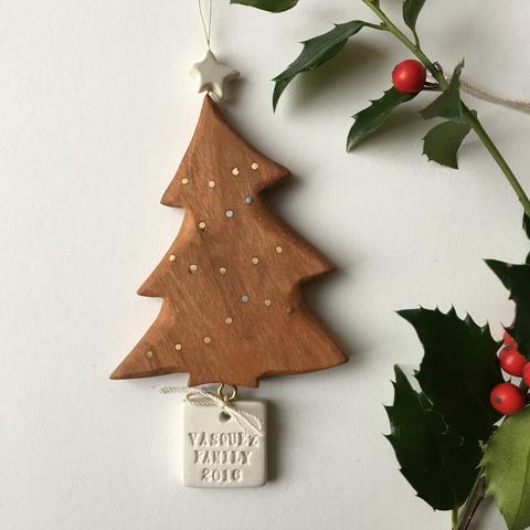 Special grandparent gifts: personalized inlaid cherry wood and ceramic tree ornament from Paloma's Nest | cool mom picks holiday gift guide