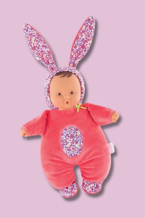 Corolle's soft baby doll has bunny ears and smells like vanilla