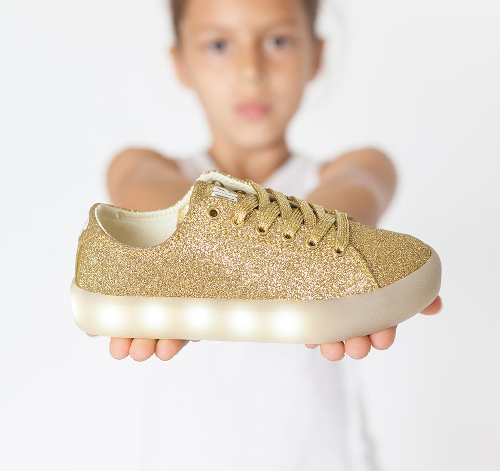 POP light-up sneakers for kids come in fun silver and gold glitter, too. You can turn the lights off, on, or have them blink.