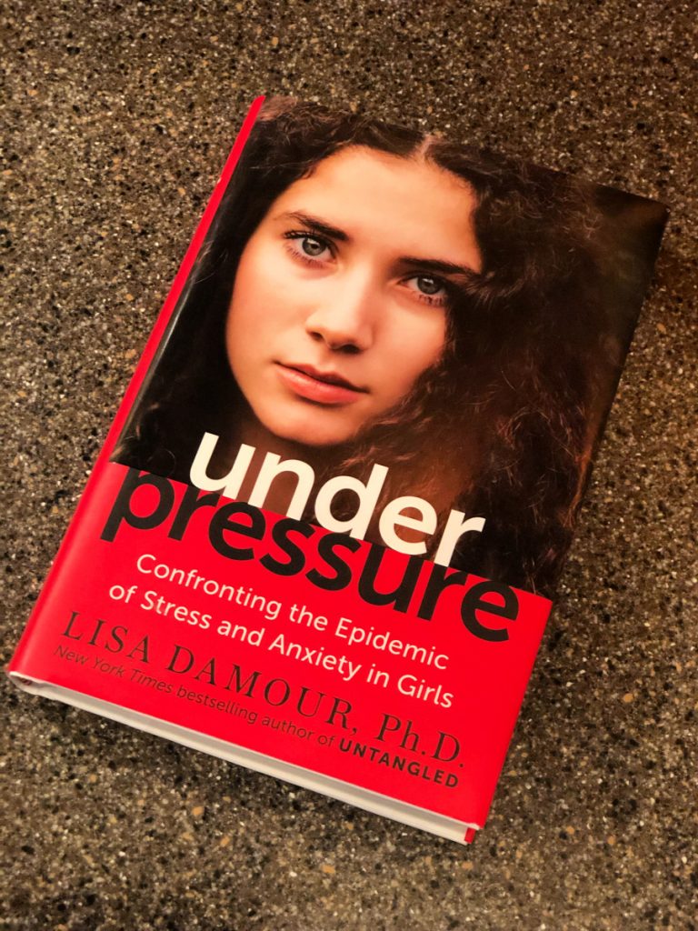 Cool Mom Picks Book Club selection 1: Under Pressure by Lisa Damour has been called "an invaluable read for anyone who has girls, works with girls, or cares about girls"