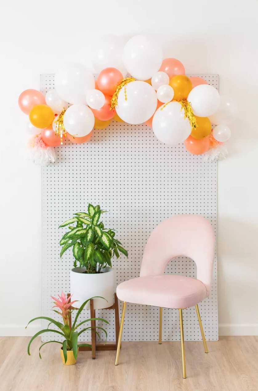 DIY balloon arches: Mounted DIY balloon arch from Spruce Crafts