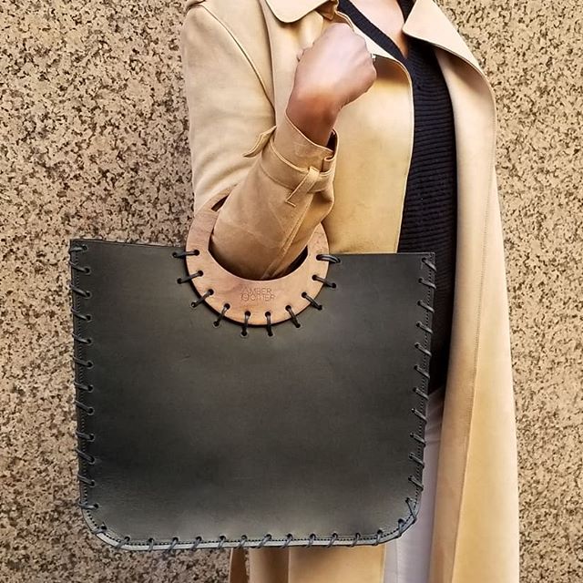 Amber Poitier Mikelle leather bag with wooden handle