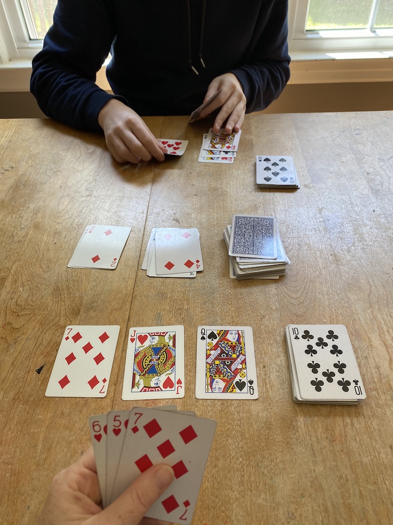 Fun card games for kids: Spite & Malice is a cutthroat 2-person game similar to solitaire | Photo © Kate Etue for Cool Mom Picks