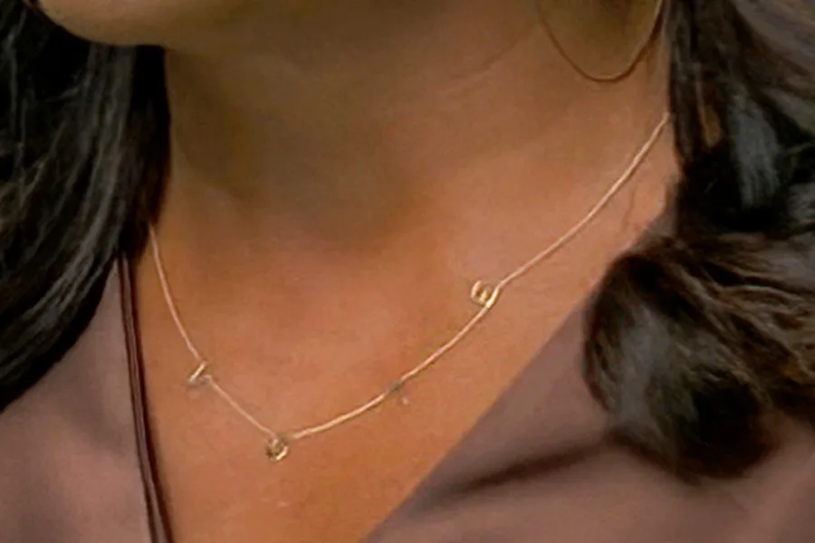 Michelle Obama’s VOTE necklace: Found it, want it.