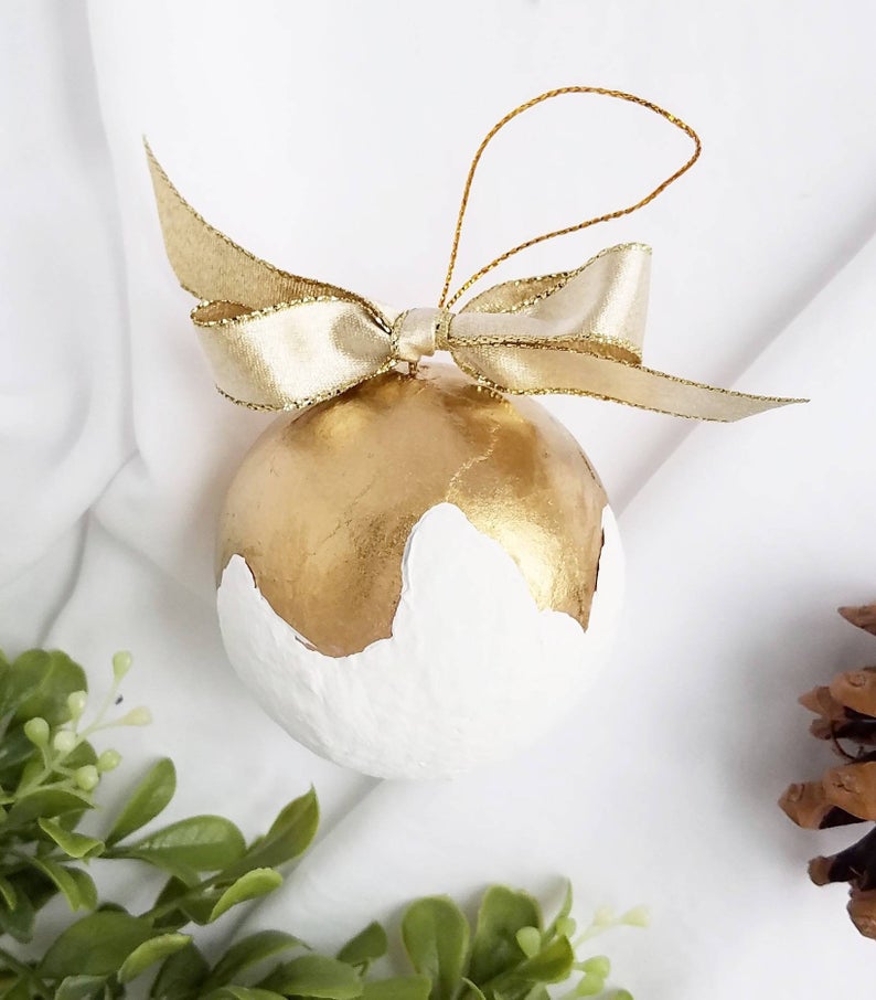 50+ cool gifts under $15 for men and women: Handmade paper mâché and gold Christmas ornaments